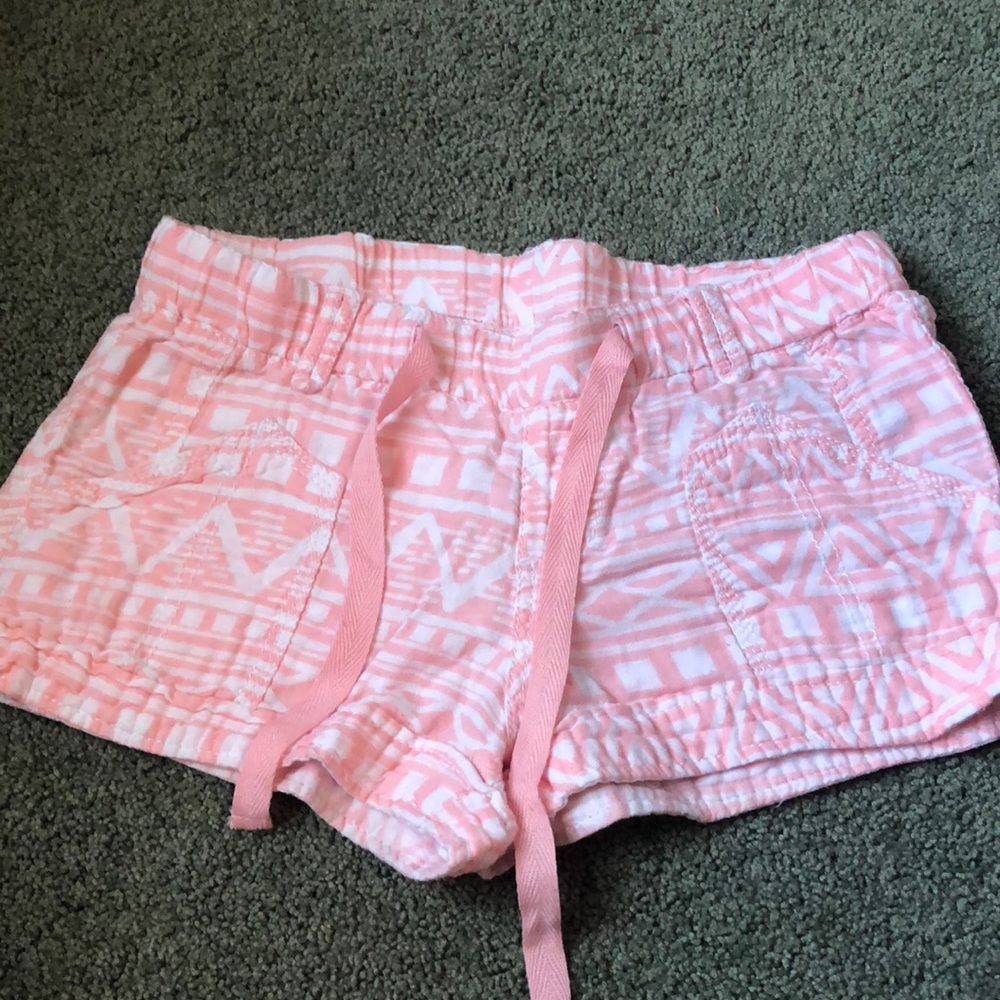 Light pink shorts with Aztec design